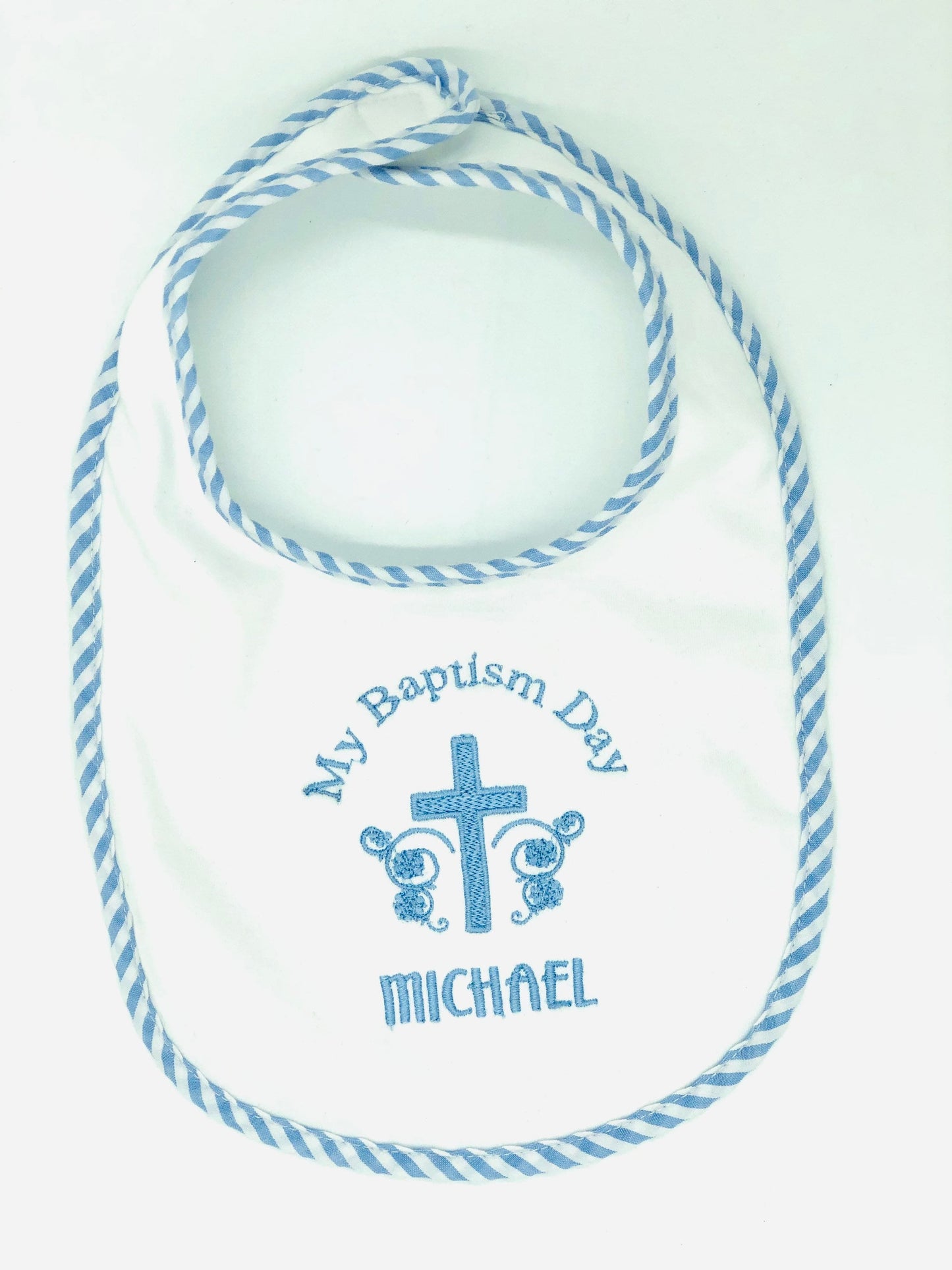 Baptism bib embroidered and personalized with baby’s name makes an excellent gift for a new baby